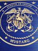 Carved wooden Navy Mustang logo